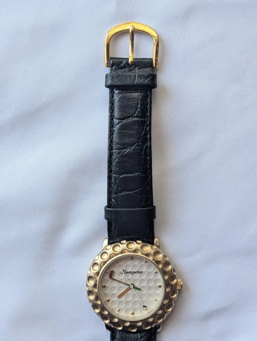 Hampden Golf Watch Golden Dimpled Bezel Club Hand Black Leather Strap Steel Back